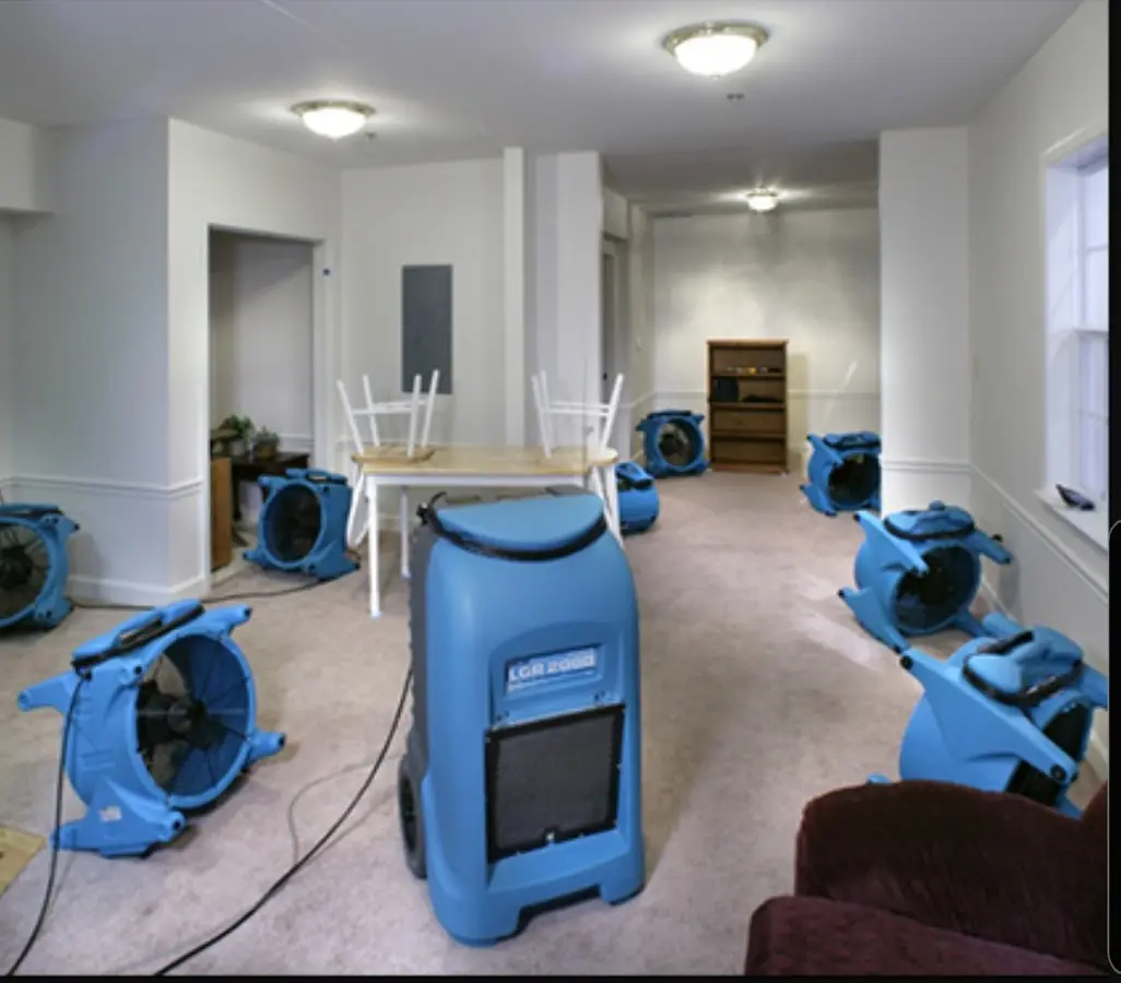 Air movers and dehumidifier setup for Water Damage Restoration in Livonia